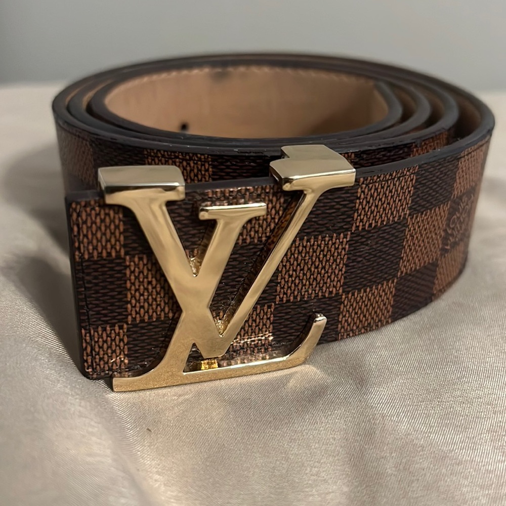 Louis Vuitton belt size 32 no longer want because I got a new one